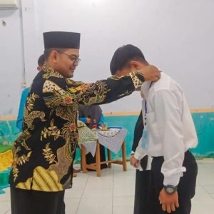 Dokumentasi Ketua STPN Penyematan tanda Peserta PBAK 2023